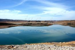 Image du Maroc Professionnelle de  Le barrage Laghrasse "dit barrage Hassan II", il se situe à 50 km au sud est de Taourirte au nord du Maroc, Samedi 10 Février 2006, ce barrage fournit en eau potable  le barrage Mohammed V qui sert de lien pour Machraa Hammadi,  ce dernier permet l'approvisionnement des centre de Taourirte et El Aïoun Sidi Mellouk. (Photo / Abdeljalil Bounhar) 